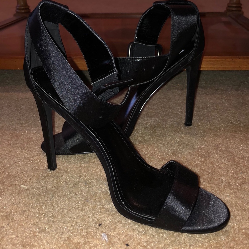 Black, thick buckle strap, open toed heels. NWOT